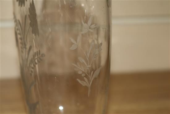 Four 18th/19th century etched glass flasks, one with silver mounted stopper tallest 19.5cm